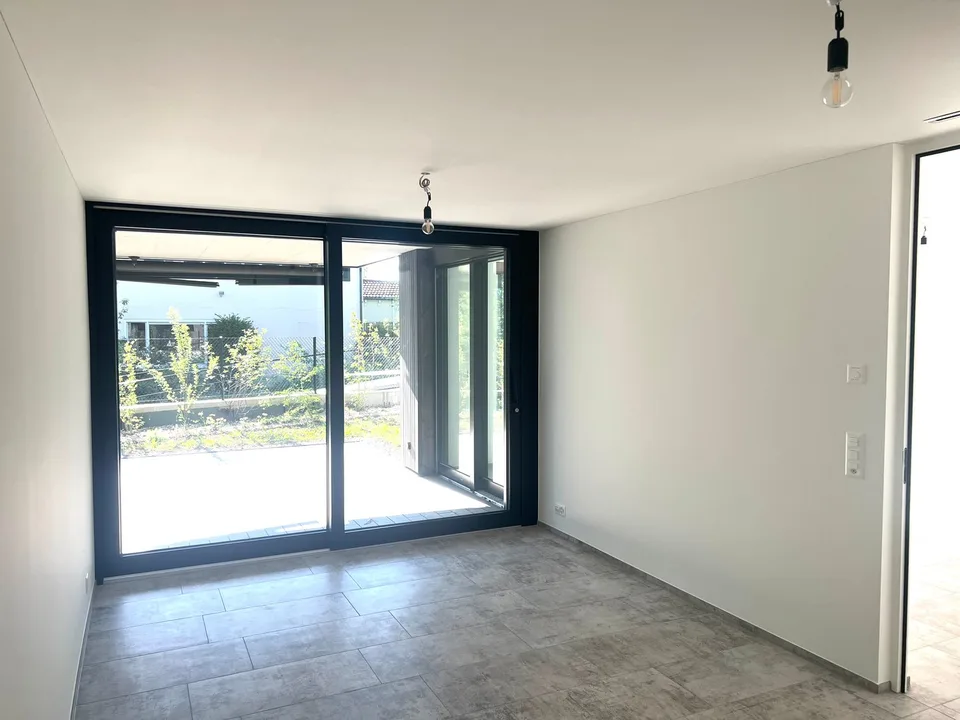 Exklusive Neubauwohnung im Erdgeschoss mit Garten - an erhöhter Lage in Witikon