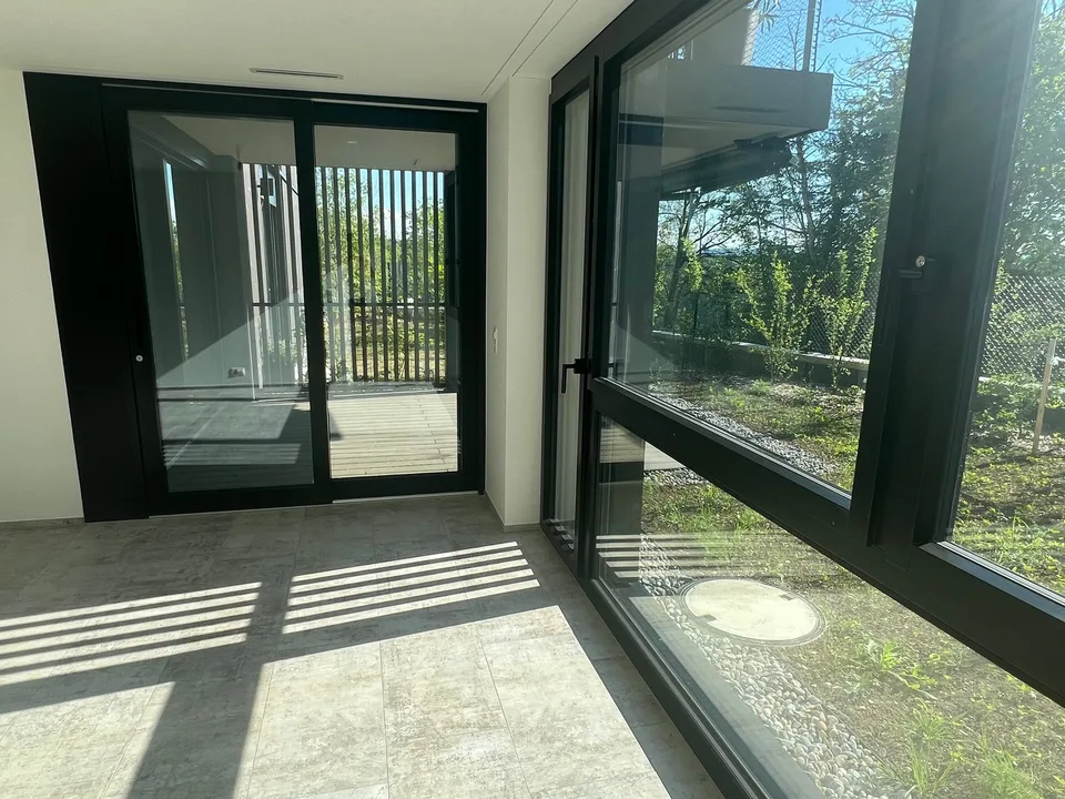 Exklusive Neubauwohnung im Erdgeschoss mit Garten - an erhöhter Lage in Witikon