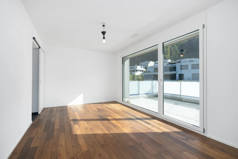 Modern attic apartment with a view of the green