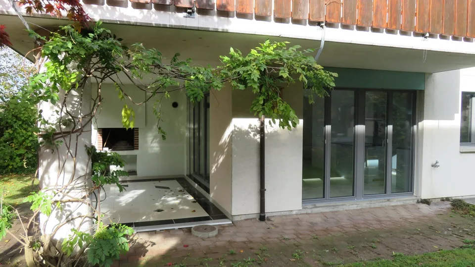 Moderne, lichtdurchflutete Wohlfühloase mit Garten & Cheminée an begehrter Lage in Winterthur
