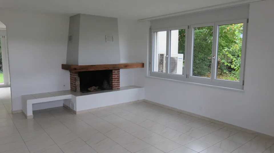 Moderne, lichtdurchflutete Wohlfühloase mit Garten & Cheminée an begehrter Lage in Winterthur