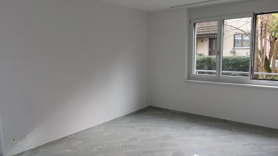 Moderne, lichtdurchflutete Wohlfühloase mit Garten & Cheminée an begehrter Lage in Winterthur