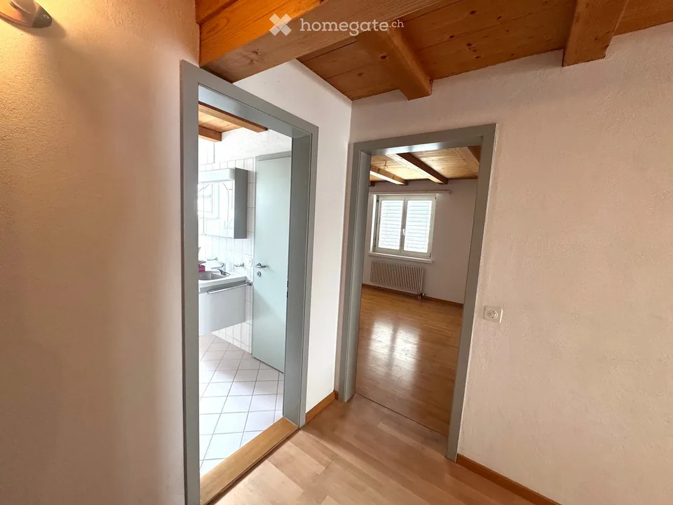 Attractive 3.5-room maisonette apartment in a central location in Beringen with a large garden seating area