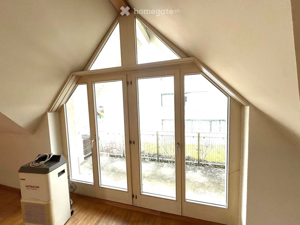 Attractive 3.5-room maisonette apartment in a central location in Beringen with a large garden seating area