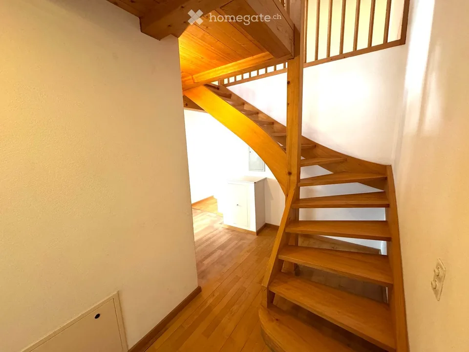 Attractive 3.5-room maisonette apartment in a central location in Beringen with a large garden seating area