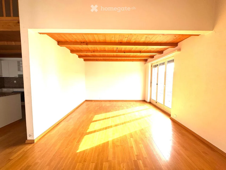 Attractive 3.5-room maisonette apartment in a central location in Beringen with a large garden seating area