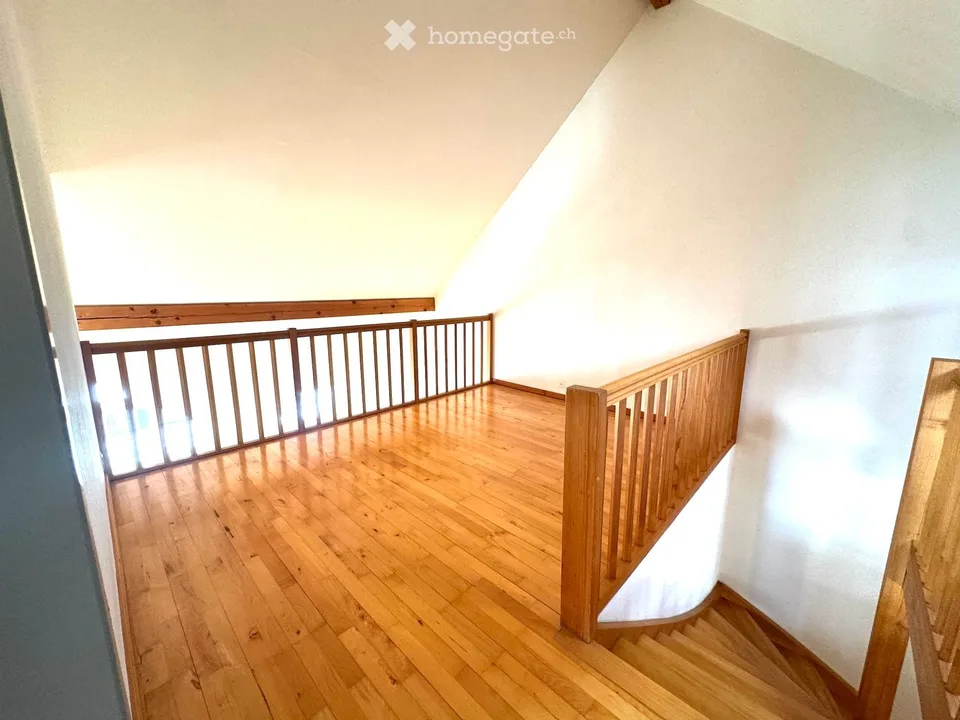 Attractive 3.5-room maisonette apartment in a central location in Beringen with a large garden seating area