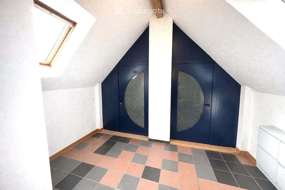 Attractive 3.5-room maisonette apartment in a central location in Beringen with a large garden seating area