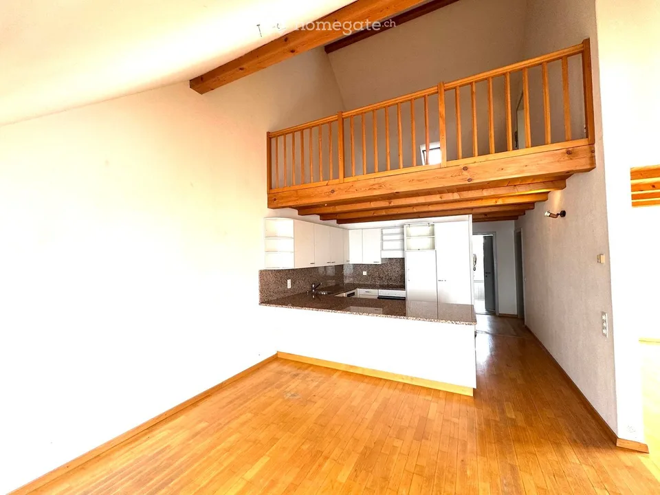 Attractive 3.5-room maisonette apartment in a central location in Beringen with a large garden seating area