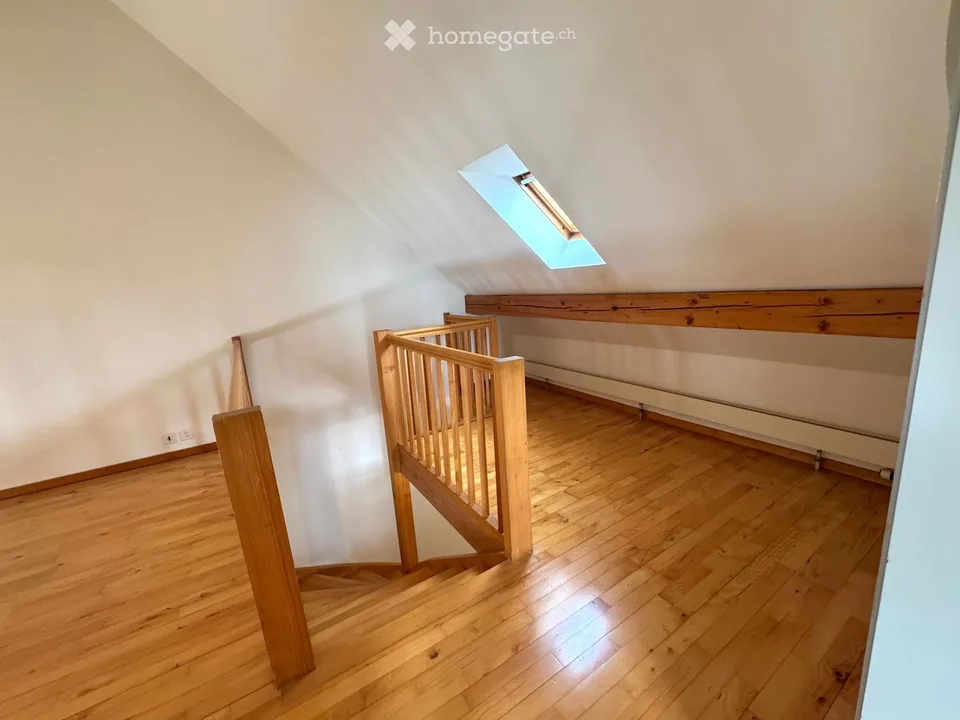 Attractive 3.5-room maisonette apartment in a central location in Beringen with a large garden seating area