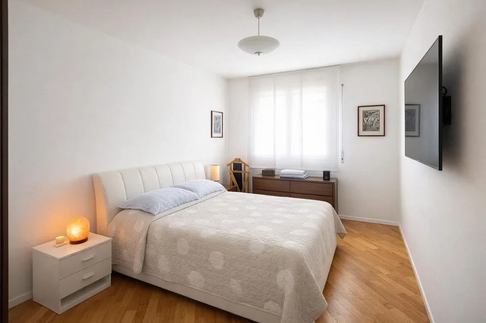 Refined 3.5-room apartment with covered terrace and premium finishes.