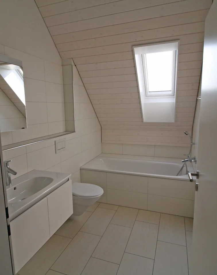 Appartement mansardé unique de 3 ½ pièces à Adlikon b. Regensdorf