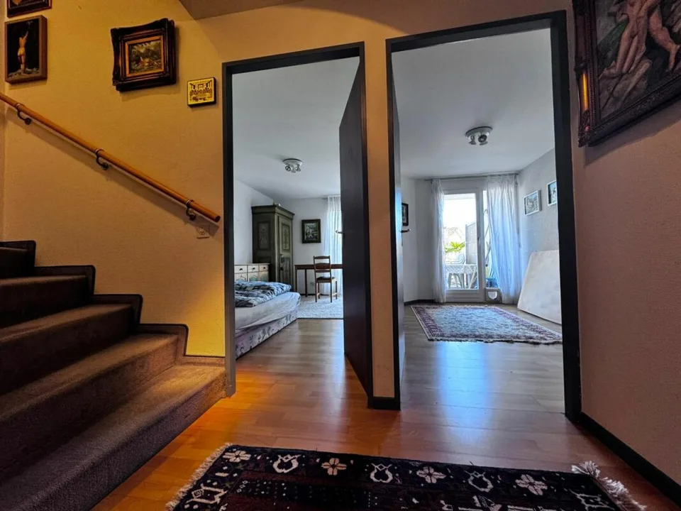 Charming 5.5-room row house with garden, new roof, garage, and parking space