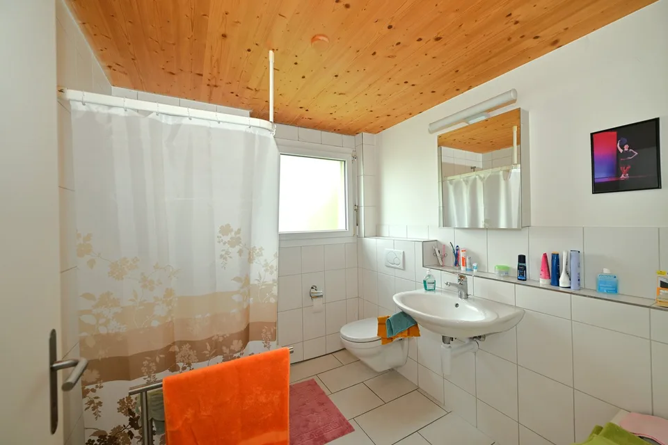 Attractive three-family house/multi-generation house in a sought-after residential area in Arlesheim