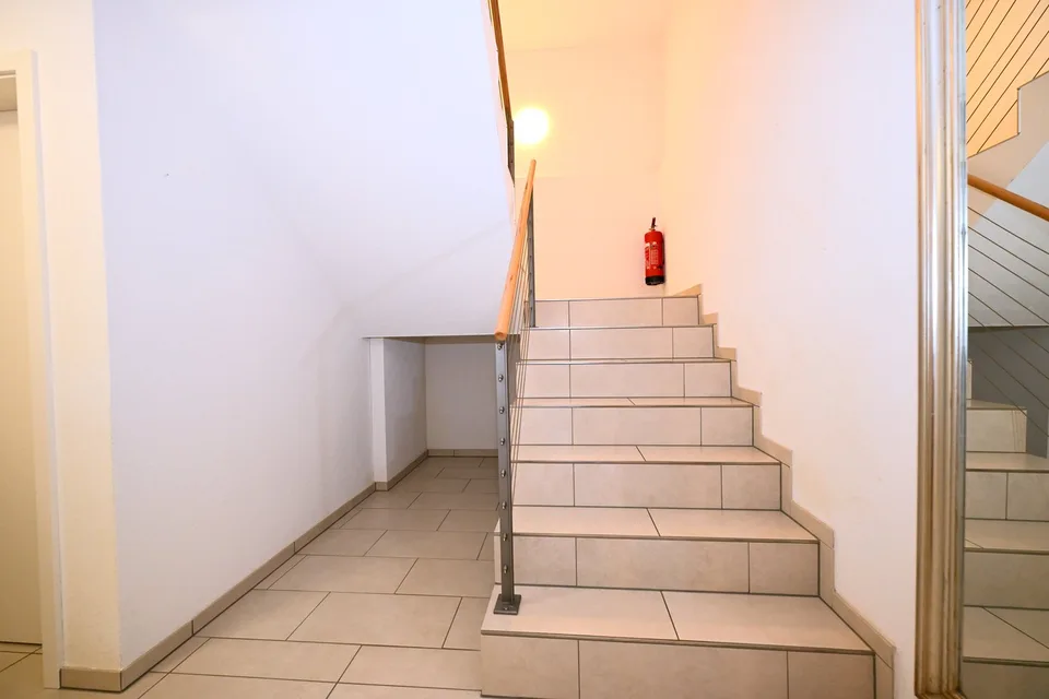 Attractive three-family house/multi-generation house in a sought-after residential area in Arlesheim