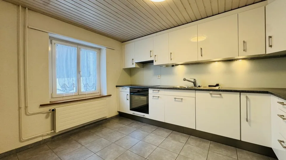 Low-maintenance two-family house with 2 residential units, garage, and 4-5 parking spaces in Ramlinsburg