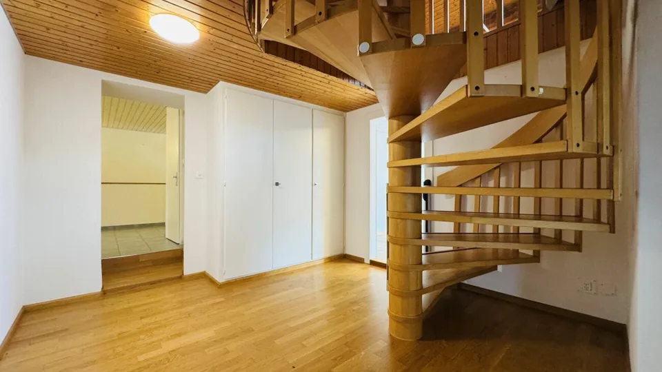 Low-maintenance two-family house with 2 residential units, garage, and 4-5 parking spaces in Ramlinsburg