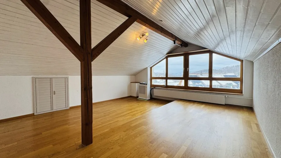 Low-maintenance two-family house with 2 residential units, garage, and 4-5 parking spaces in Ramlinsburg