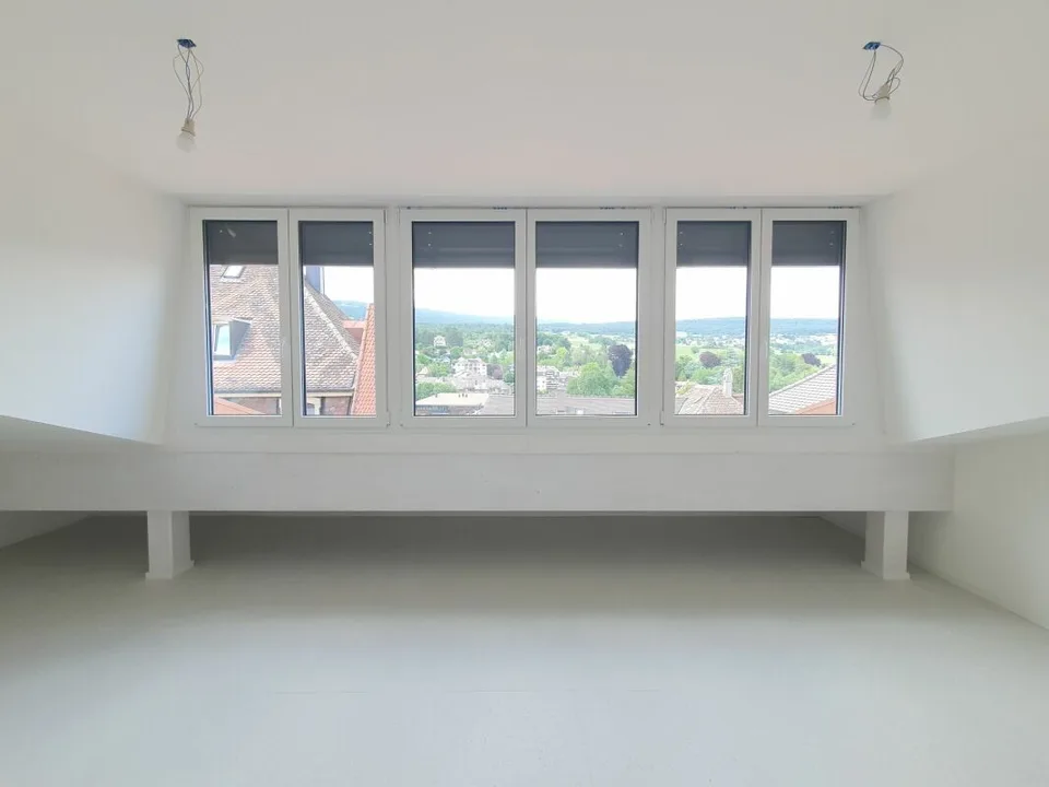 Appartement de 2,5 pièces + espace sous comble