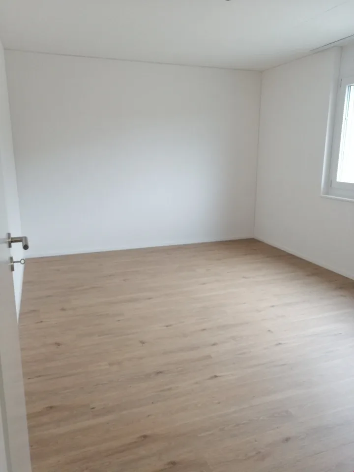 Appartement de 2,5 pièces idéalement situé au 1er étage avec balcon