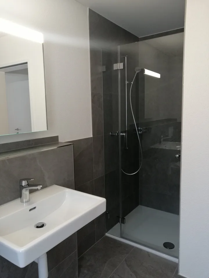 Appartement de 2,5 pièces idéalement situé au 1er étage avec balcon