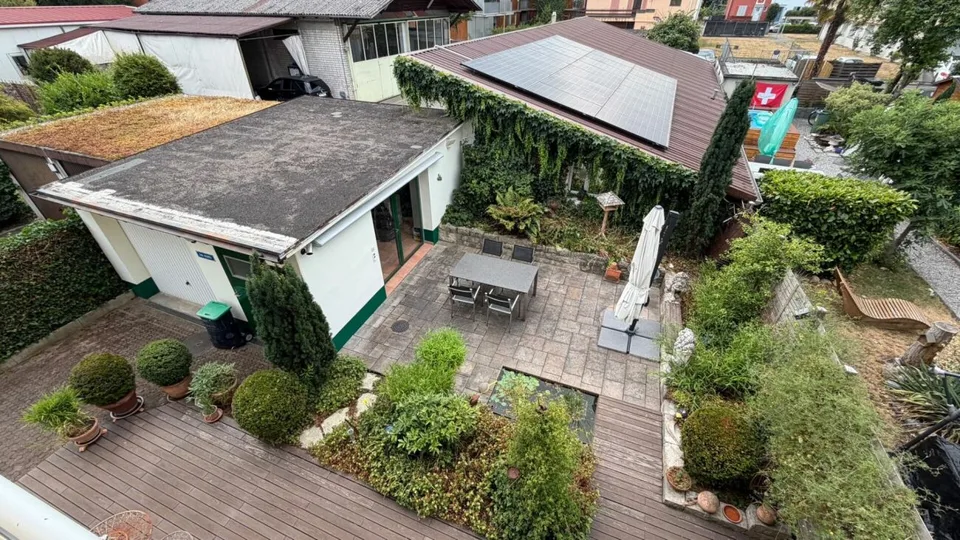 House with 6.5-room maisonette and rented 3-room apartment