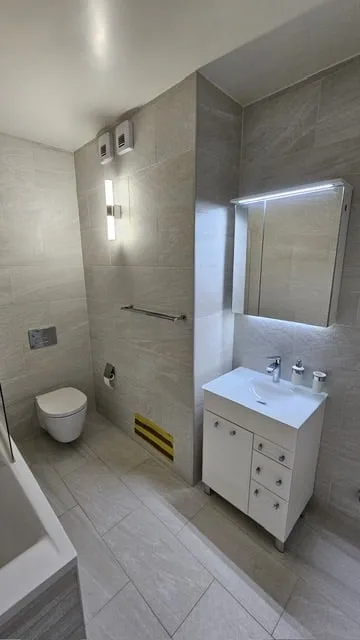 Appartement 3.5 pièces et grande  terrasse à Meyrin avec parking privé et cave