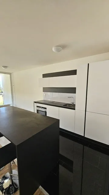 Appartement 3.5 pièces et grande  terrasse à Meyrin avec parking privé et cave