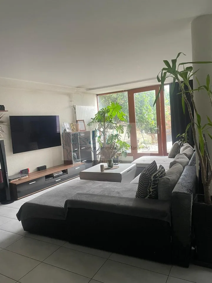 Grand appartement de 2.5 pièces avec jardin privatif