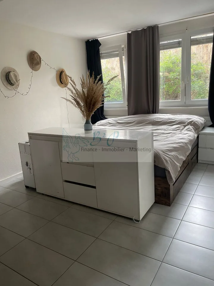 Grand appartement de 2.5 pièces avec jardin privatif