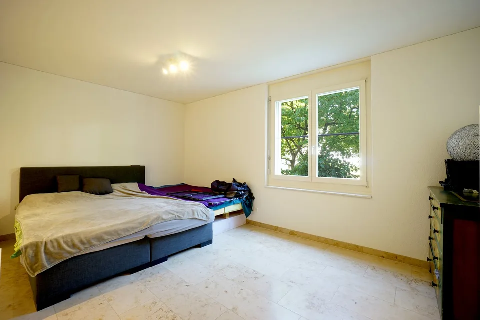 Well-maintained 2.5 room garden apartment in an attractive and sunny location with a large garden