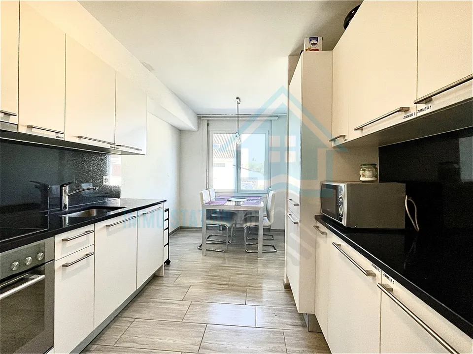 Modern furnished shared room with balcony in central location