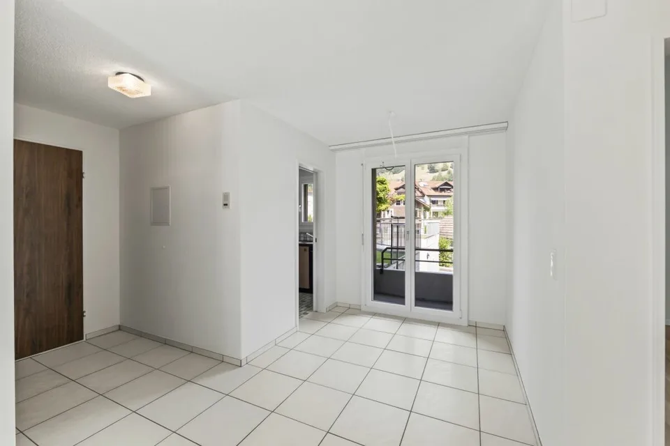 Appartement lumineux 3.5 pièces avec balcon, jardin d'hiver avec vue sur la verdure, parking EH