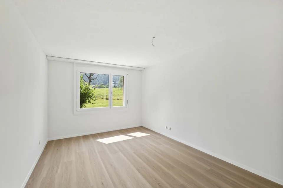 Appartement lumineux 3.5 pièces avec balcon, jardin d'hiver avec vue sur la verdure, parking EH