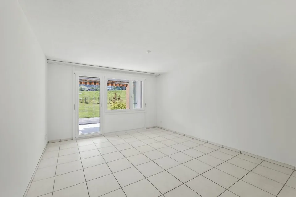 Appartement lumineux 3.5 pièces avec balcon, jardin d'hiver avec vue sur la verdure, parking EH