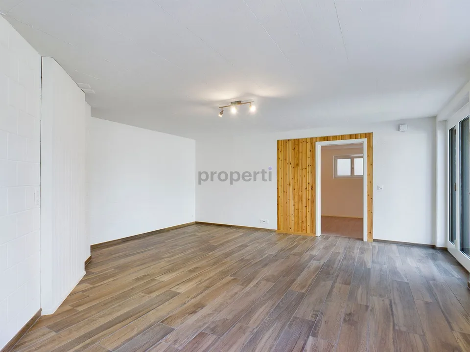 Charmante 2.5-Zimmer Wohnung in ruhigem Einfamilienhaus-Wohnquartier