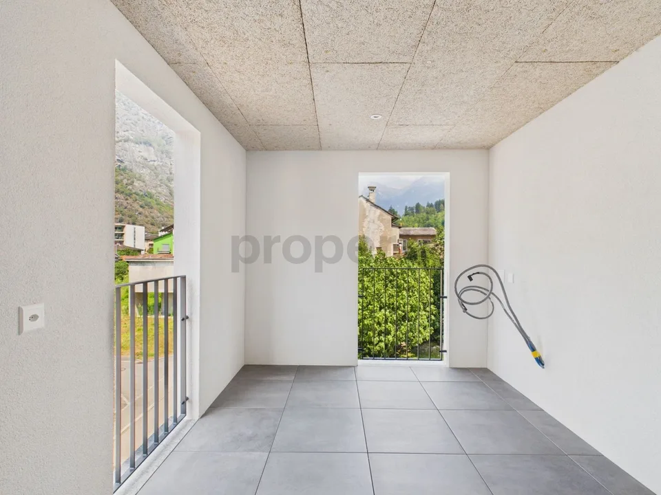 Modern 3.5-room apartment with indoor parking, Biasca