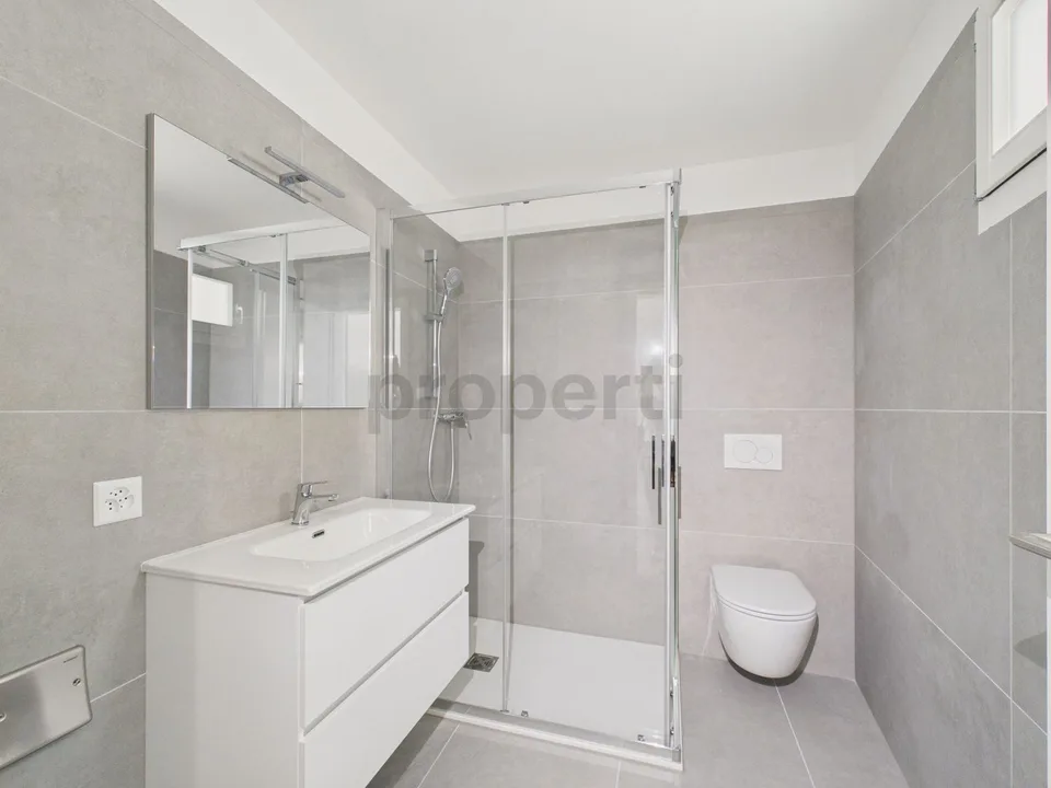 Modern 3.5-room apartment with indoor parking, Biasca