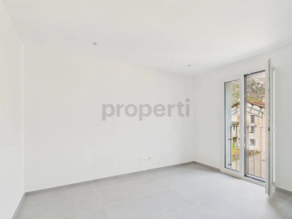 Modern 3.5-room apartment with indoor parking, Biasca