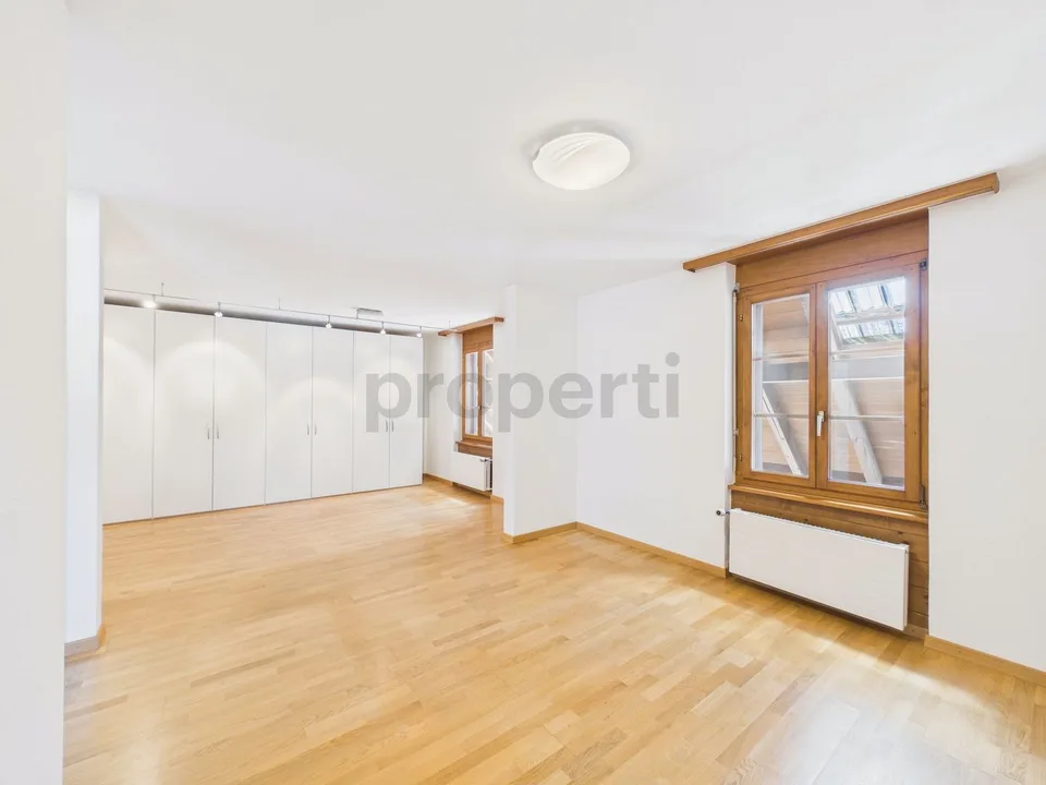 Appartement moderne 3.5 pièces avec plan d'étage spacieux et espace extérieur ensoleillé à Utzigen