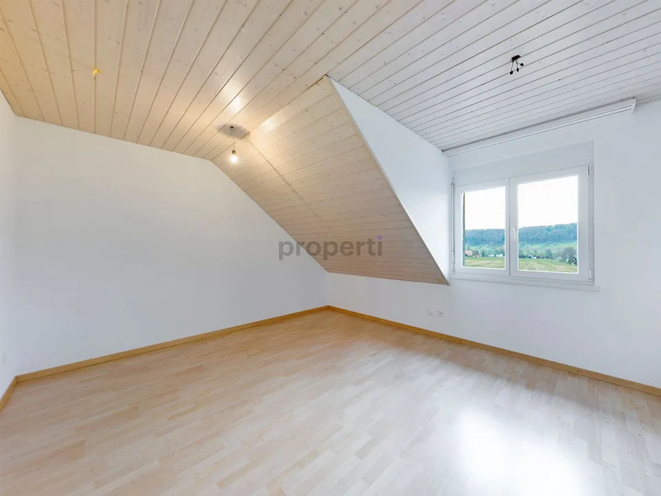 Bright attic apartment with sunny south balcony