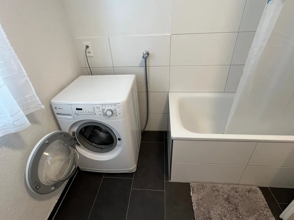Appartement-maisonnette de 4,5 pièces avec beaucoup de charme et un grand balcon.