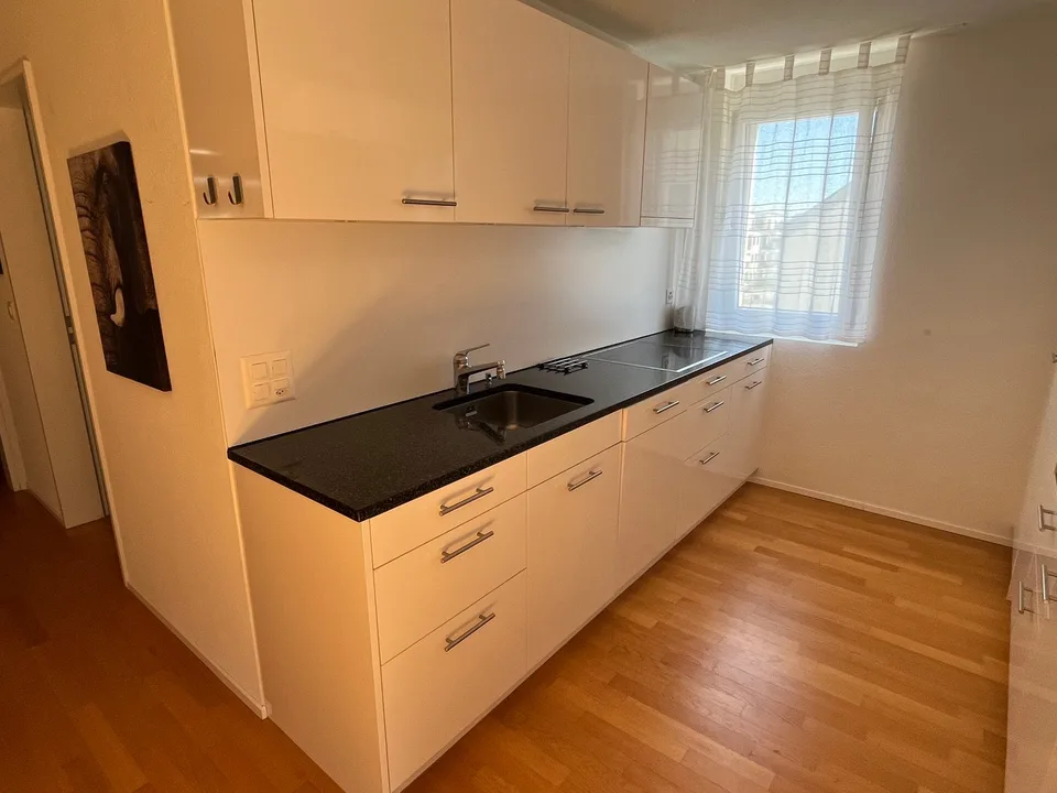 Appartement-maisonnette de 4,5 pièces avec beaucoup de charme et un grand balcon.