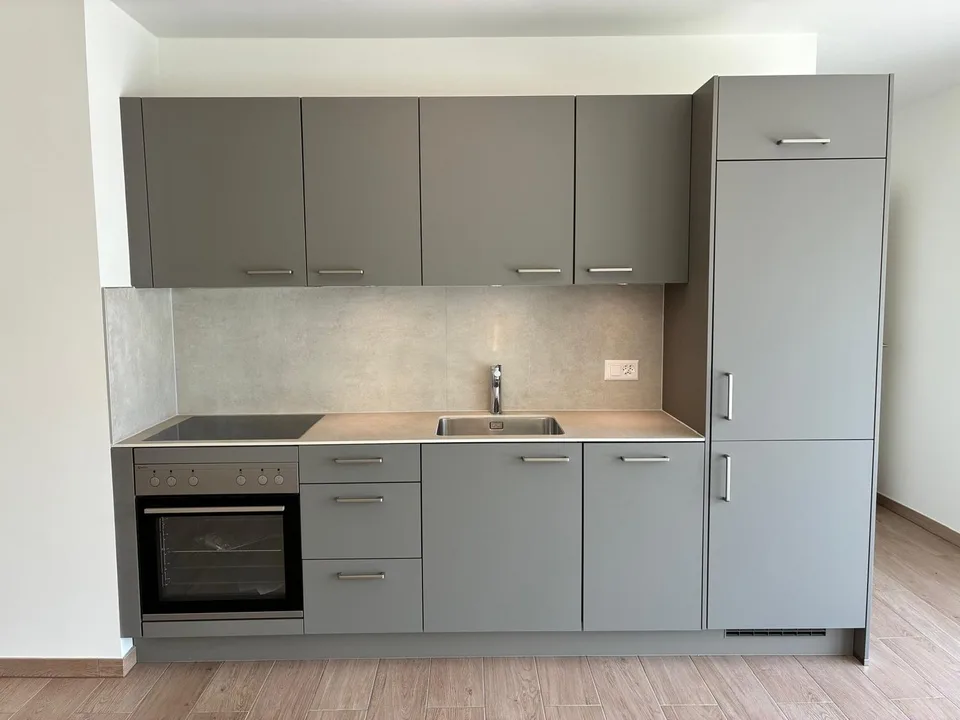 Attique – Neuf – Place de parc intérieure – Grand balcon