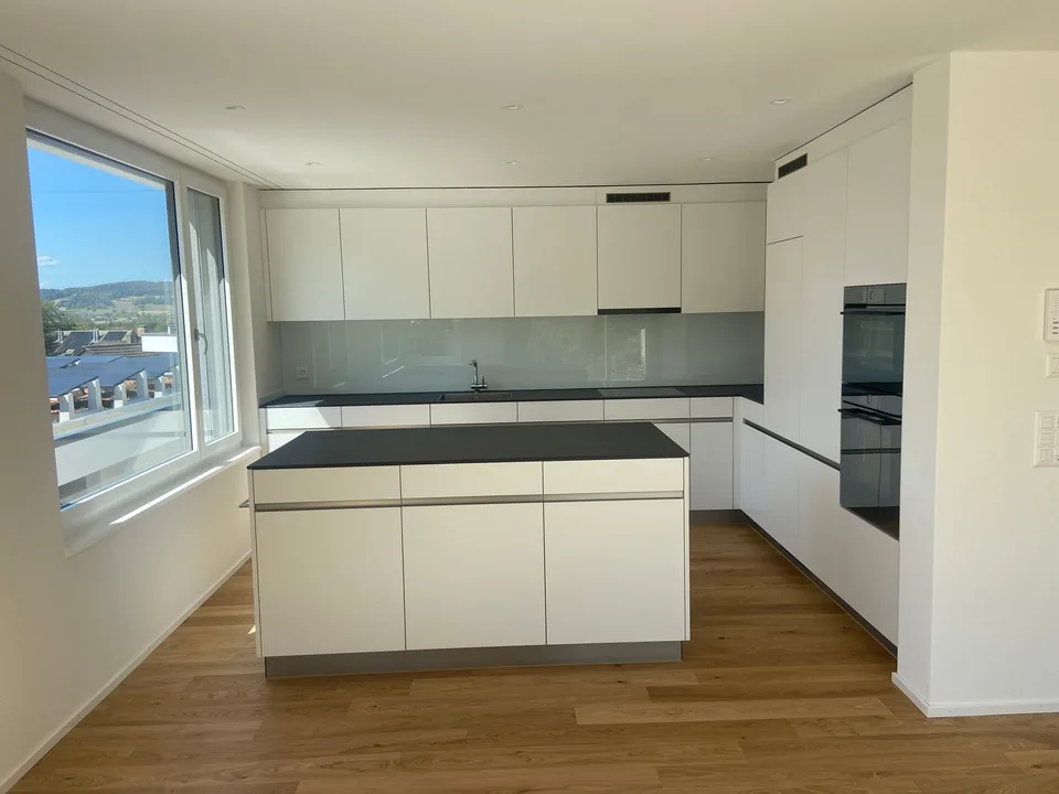 4.5-Zimmer-Doppeleinfamilienhaus an privilegierter Hanglage