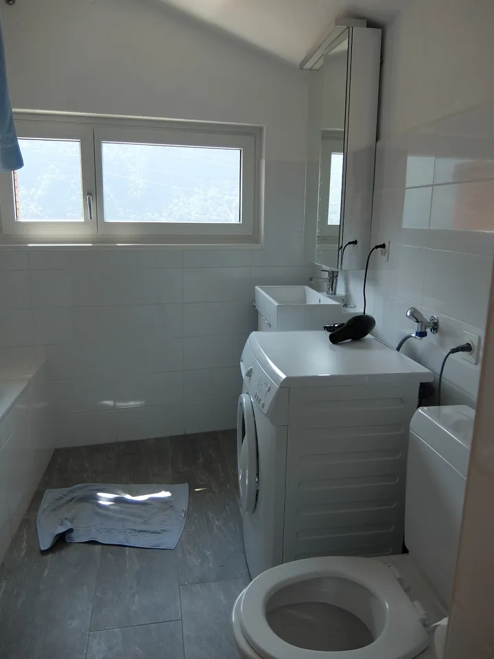 Si affitta a Gandria straordinario appartamento con giardino e vista lago
