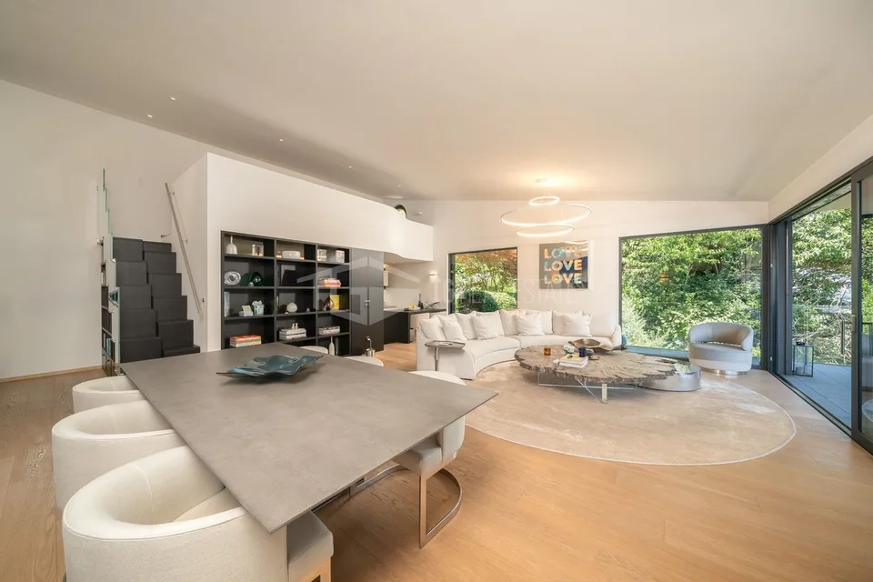 Appartement élégant de 4 pièces avec jardin et vue sur le lac
