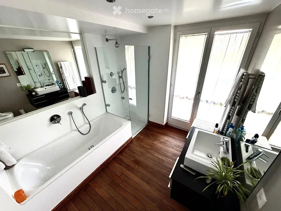 SPECTACULAIRE TRIPLEX DANS UNE MAISON DE VILLAGE AU COEUR DU PETIT-LANCY