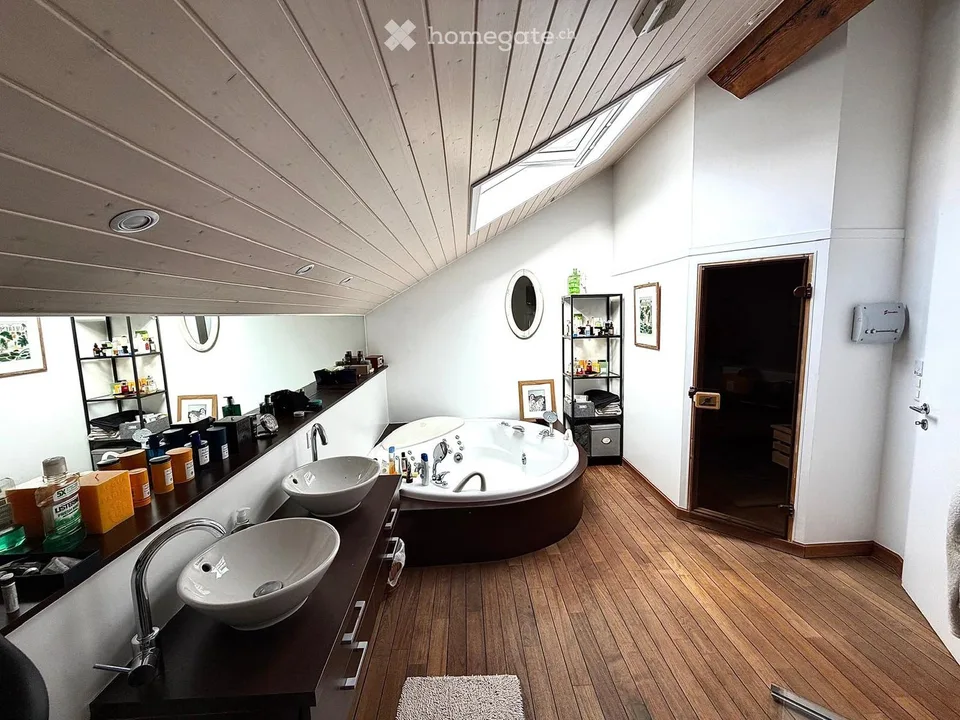 SPECTACULAIRE TRIPLEX DANS UNE MAISON DE VILLAGE AU COEUR DU PETIT-LANCY