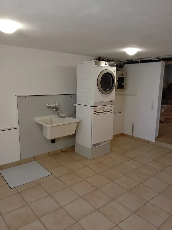 Casa familiare di 5,5 locali con camino e garage